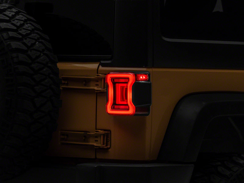 
    

Raxiom J164242 - RAXJ164242 - Raxiom 07-18 Jeep Wrangler JK Axial Series JL Style LED Tail Lights- Black Housing- Red Lens - Shipped in Europe - Tuningsupply.com

  
