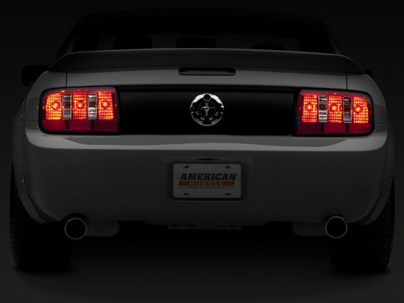 

Raxiom 49123 - RAX49123 - Raxiom 05-09 Ford Mustang Coyote Tail Lights- Chrome Housing - Red/Clear Lens - Shipped in Europe - Tuningsupply.com
