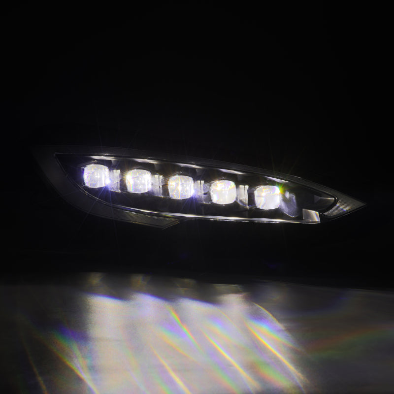 

AlphaRex  - ARX880877 - AlphaRex 12-21 Tesla Model S NOVA-Series LED Proj Headlights Blk w/Activtn Light & Seq.Sig / SB DRL - Shipped in Europe - Tuningsupply.com
