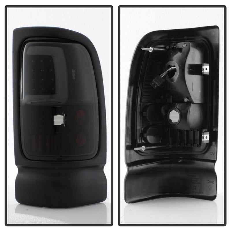 

SPYDER 9038877 - SPY9038877 - xTune Dodge Ram 1500 94-01 Tail Lights - Light Bar LED - Black ALT-ON-DRAM94V3-LBLED-BSM - Shipped in Europe - Tuningsupply.com
