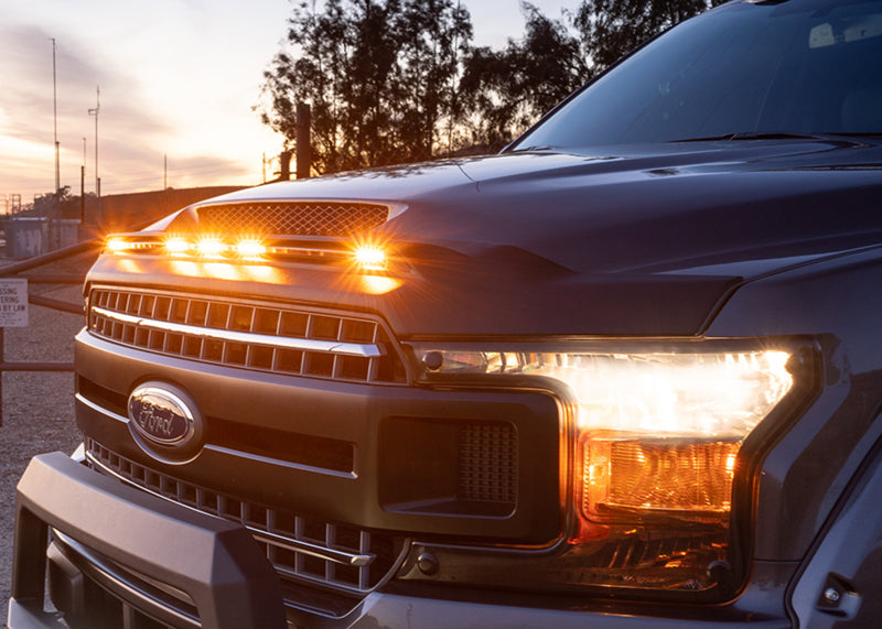 AVS 2016-2019 Toyota Tacoma Aeroskin Low Profile Hood Shield w/ Lights - Black-tuningsupply.com