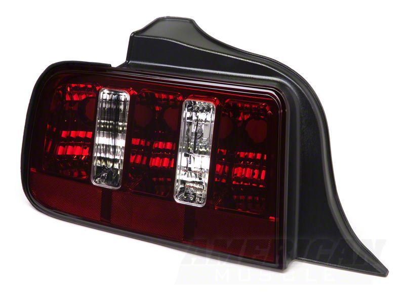 

Raxiom 49117 - RAX49117 - Raxiom 05-09 Ford Mustang Coyote Tail Lights- Black Housing (Smoked Lens) - Shipped in Europe - Tuningsupply.com

