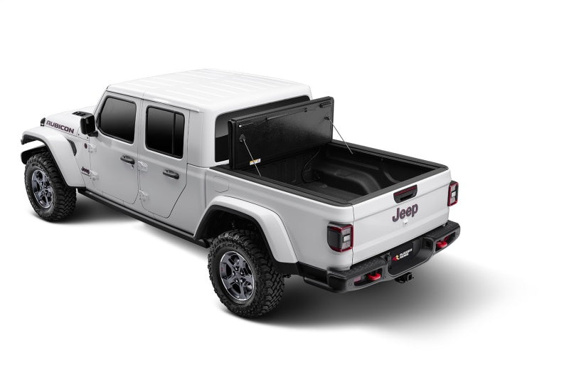 

Rugged Ridge 13550.24 - RUG13550.24 - Rugged Ridge Armis Hard Folding With LINE-X Bed Cover 2020 JT - Shipped in Europe - Tuningsupply.com
