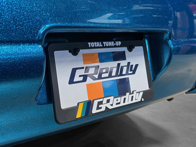 

GReddy 21112000 - GRE21112000 - GReddy Total Tune Up License Plate Frame - 3 Color - Shipped in Europe - Tuningsupply.com
