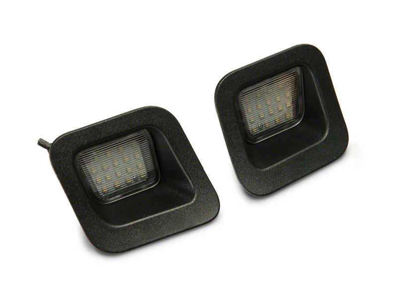 

Raxiom R109176 - RAXR109176 - Raxiom 03-18 Dodge RAM 1500 Axial Series LED License Plate Lamps - Shipped in Europe - Tuningsupply.com
