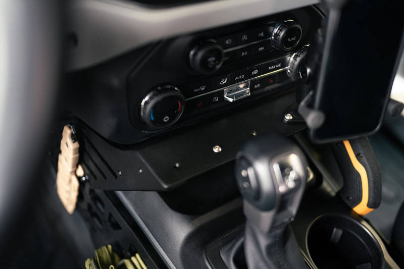 

DV8 Offroad CCBR-01 - DVECCBR-01 - DV8 21-23 Ford Bronco Center Console Molle Panels & Bridge - Shipped in Europe - Tuningsupply.com
