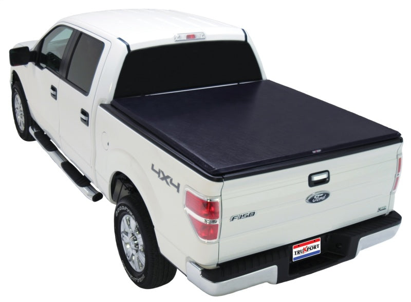 

Truxedo 238101 - TRX238101 - Truxedo 73-96 Ford F-150/250/250 HD/350 6ft 6in TruXport Bed Cover - Shipped in Europe - Tuningsupply.com
