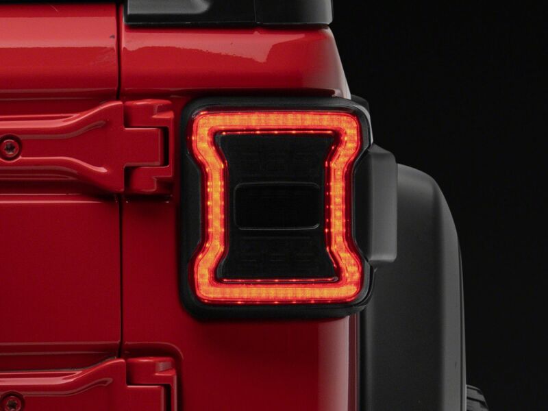 

Raxiom J181425 - RAXJ181425 - Raxiom 18-26 Jeep Wrangler JL LED Tail Lights- Red Housing- Smoked Lens - Shipped in Europe - Tuningsupply.com
