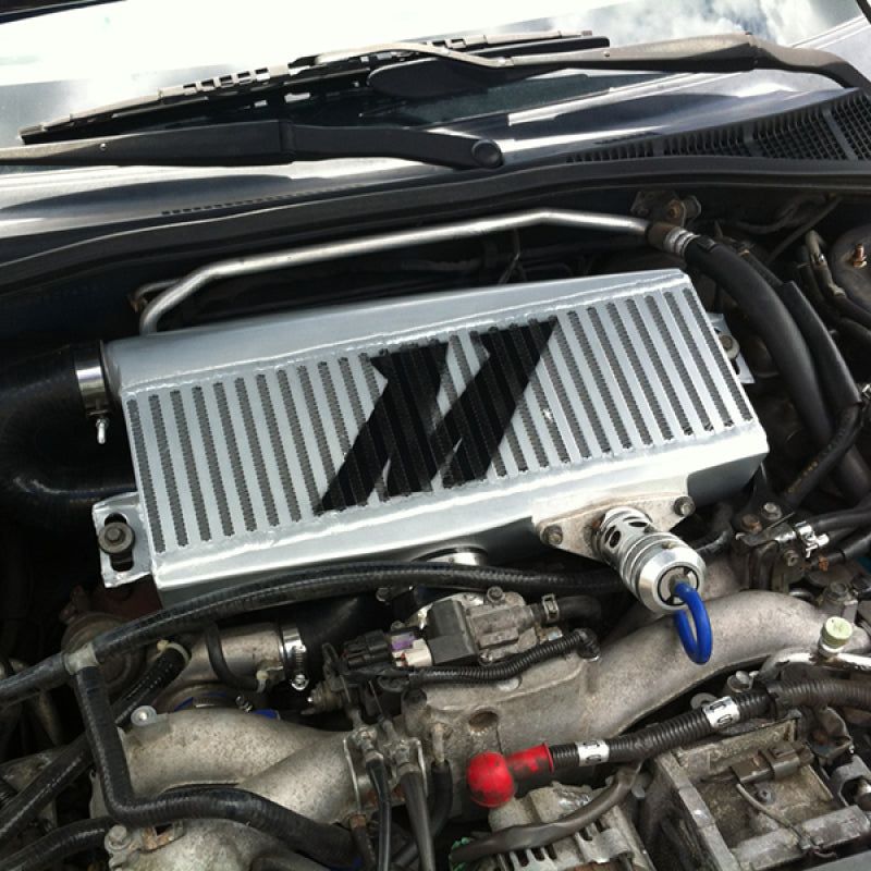 Mishimoto Subaru 02-07 WRX/04-07 STi Top-Mount Intercooler Kit - Powder Coated Silver & Blue Hoses-tuningsupply.com