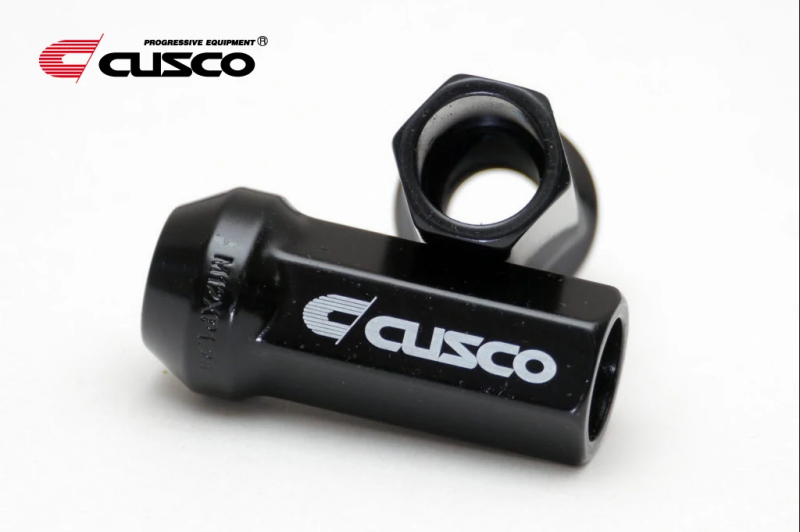 

Cusco 00B 738 12520B - CUS00B 738 12520B - Cusco Wheel Lug Nut Set - M12 x P1.25mm - Black (20pcs) - Shipped in Europe - Tuningsupply.com
