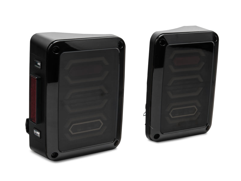 

Raxiom J106751 - RAXJ106751 - Raxiom 07-18 Jeep Wrangler JK LED Tail Lights- Black Housing (Smoked Lens) - Shipped in Europe - Tuningsupply.com
