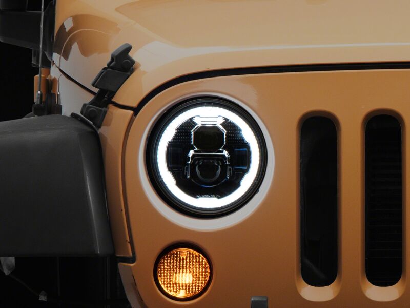 

Raxiom J178741 - RAXJ178741 - Raxiom 07-18 Jeep Wrangler Axial Series 7-Inch LED Headlights w DRL/ Black Housing - Clear Lens - Shipped in Europe - Tuningsupply.com
