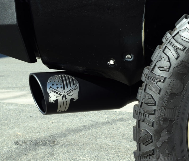 

Gibson 76-0038 - GIB76-0038 - Gibson 18-22 Jeep Wrangler Sport 3.6L 2.5in Patriot Skull Series Cat-Back Dual Exhaust - Blk Ceramic - Shipped in Europe - Tuningsupply.com
