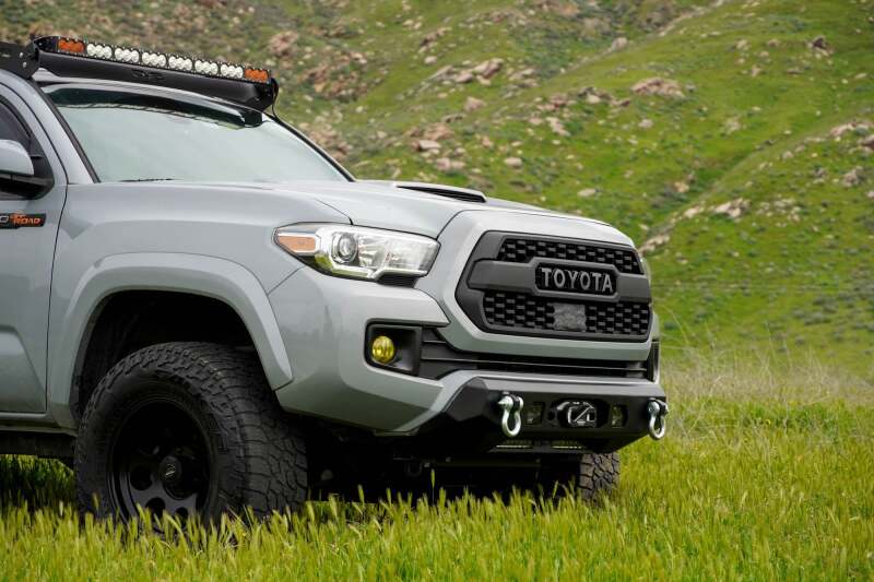 

DV8 Offroad FBTT1-06 - DVEFBTT1-06 - DV8 16-23 Toyota Tacoma Center Mount Winch Front Bumper - Shipped in Europe - Tuningsupply.com
