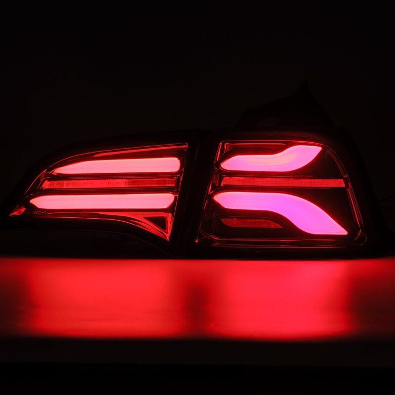 

AlphaRex 601010 - ARX601010 - AlphaRex 17-22 Tesla Model 3 PRO-Series LED Tail Lights Jet Black w/Seq Sig - Shipped in Europe - Tuningsupply.com
