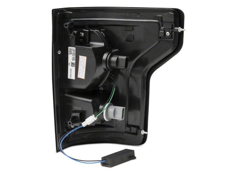 

Raxiom T544625 - RAXT544625 - Raxiom 15-17 Ford F-150 LED Tail Lights w/ SEQL Turn Signals- Black Housing (Clear Lens) - Shipped in Europe - Tuningsupply.com
