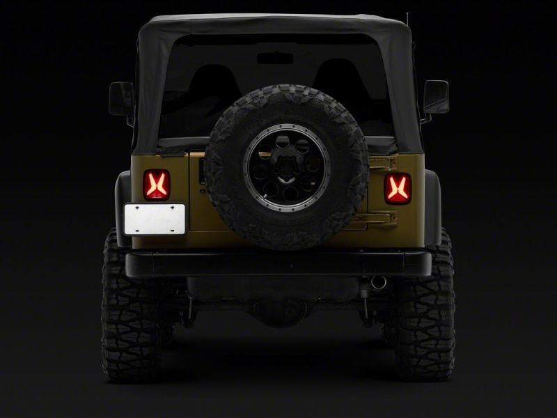 

Raxiom J177410 - RAXJ177410 - Raxiom 76-06 Jeep CJ7 Wrangler YJ & TJ Gladiator LED Tail Lights- Black Housing (Smoked Lens) - Shipped in Europe - Tuningsupply.com
