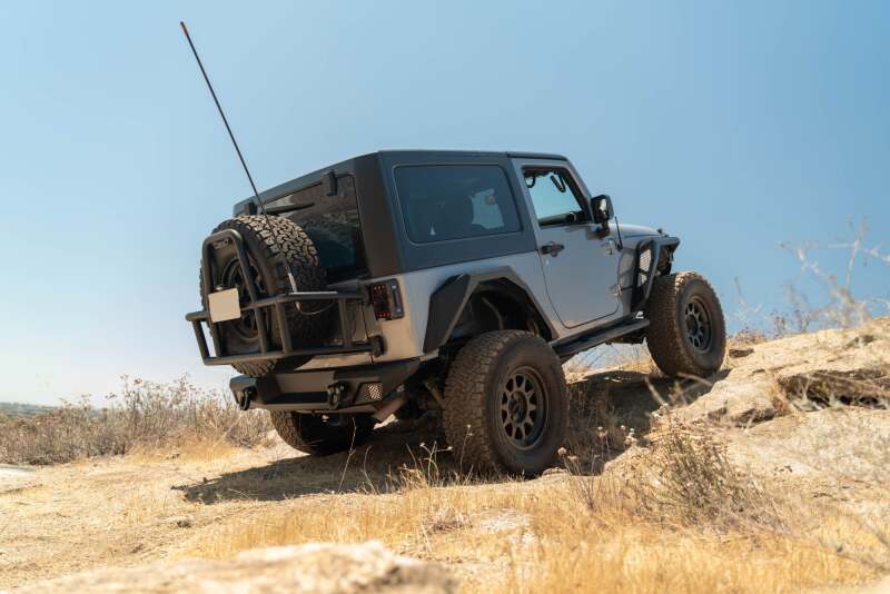 

DV8 Offroad TCJK-14 - DVETCJK-14 - DV8 07-18 Jeep Wrangler JK Body Mounted Tire Carrier - Shipped in Europe - Tuningsupply.com
