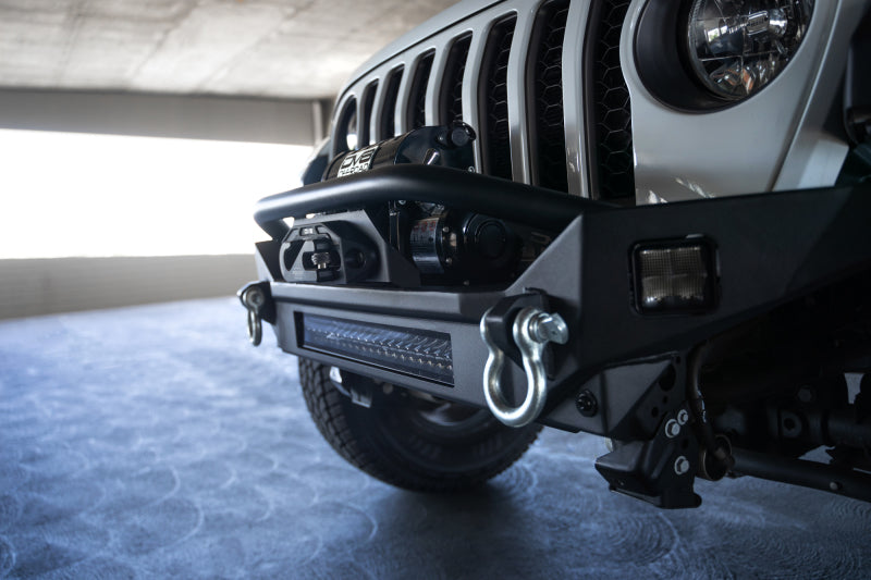 

DV8 Offroad  - DVEFBJL-07 - DV8 Offroad 18-23 Jeep Wrangler JL / 20-23 Jeep Gladiator JT FS-7 Mid-Width Winch Front Bumper - Shipped in Europe - Tuningsupply.com
