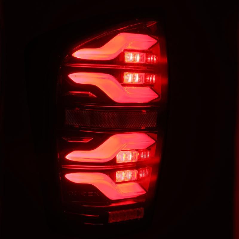 AlphaRex 16-21 Toyota Tacoma LUXX LED Taillights Blk/Red w/Activ Light/Seq Signal-tuningsupply.com