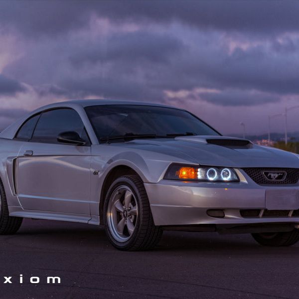 Raxiom 99-04 Ford Mustang Dual LED Halo Projector Headlights- Black Housing (Smoked Lens)-Headlights-Raxiom-RAX49113-SMINKpower Performance Parts