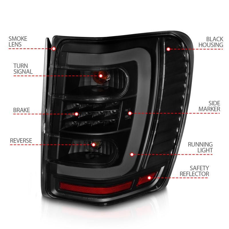 ANZO 1999-2004 Jeep Grand Cherokee LED Tail Lights w/ Light Bar Black Housing Smoke Lens-tuningsupply.com