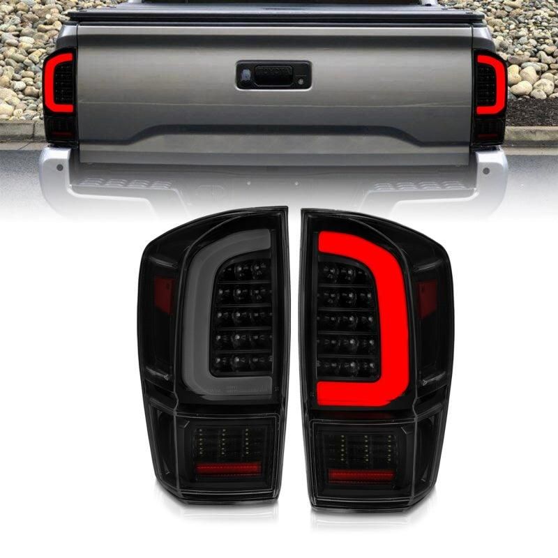 ANZO 16-21 Toyota Tacoma LED Tail Lights - w/ Light Bar Sequential Black Housing & Smoke Lens-tuningsupply.com