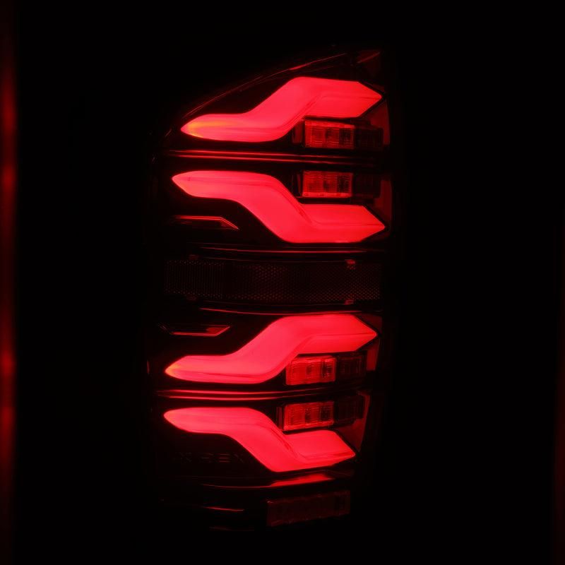 AlphaRex 16-21 Toyota Tacoma LUXX LED Taillights Blk/Red w/Activ Light/Seq Signal-tuningsupply.com