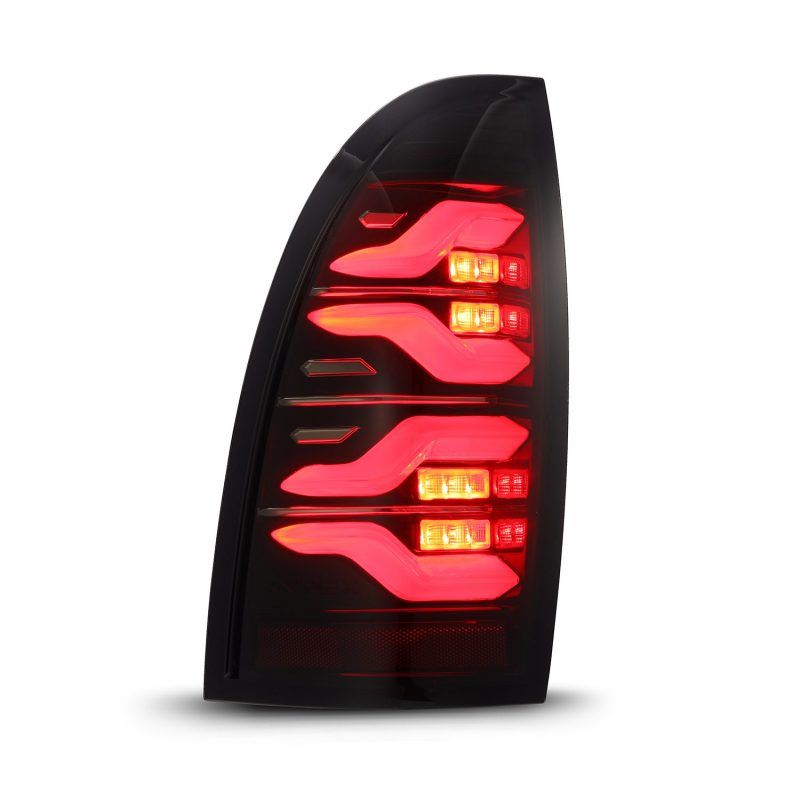 AlphaRex 05-15 Toyota Tacoma LUXX LED Taillights Blk/Red w/Activ Light/Seq Signal-tuningsupply.com