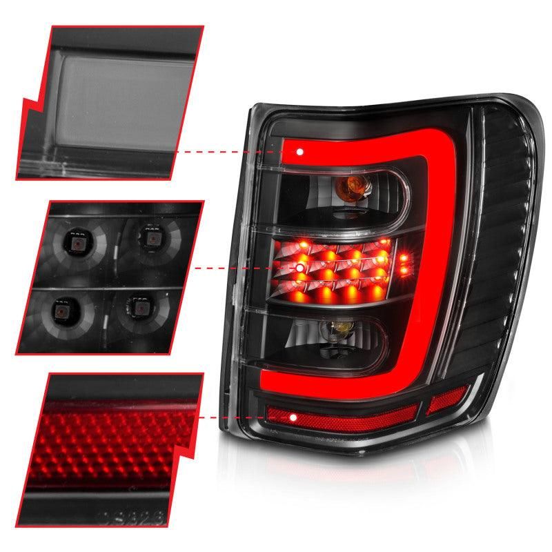 ANZO 1999-2004 Jeep Grand Cherokee LED Tail Lights w/ Light Bar Black Housing Clear Lens-tuningsupply.com