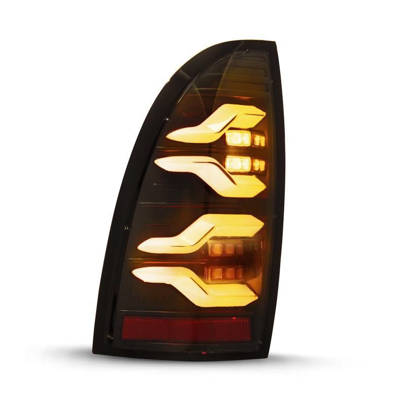 AlphaRex 05-15 Toyota Tacoma LUXX LED Taillights Blk w/Activ Light/Seq Signal-tuningsupply.com