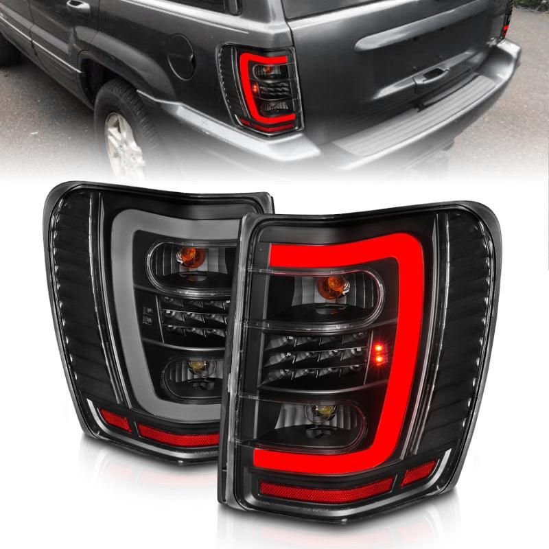 ANZO 1999-2004 Jeep Grand Cherokee LED Tail Lights w/ Light Bar Black Housing Clear Lens-tuningsupply.com