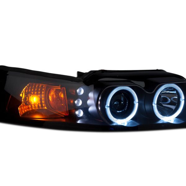 Raxiom 99-04 Ford Mustang Dual LED Halo Projector Headlights- Black Housing (Smoked Lens)-Headlights-Raxiom-RAX49113-SMINKpower Performance Parts